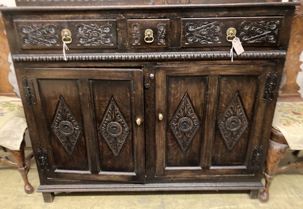 A late 18th century carved oak court cupboard, width 130cm, depth 52cm, height 170cm